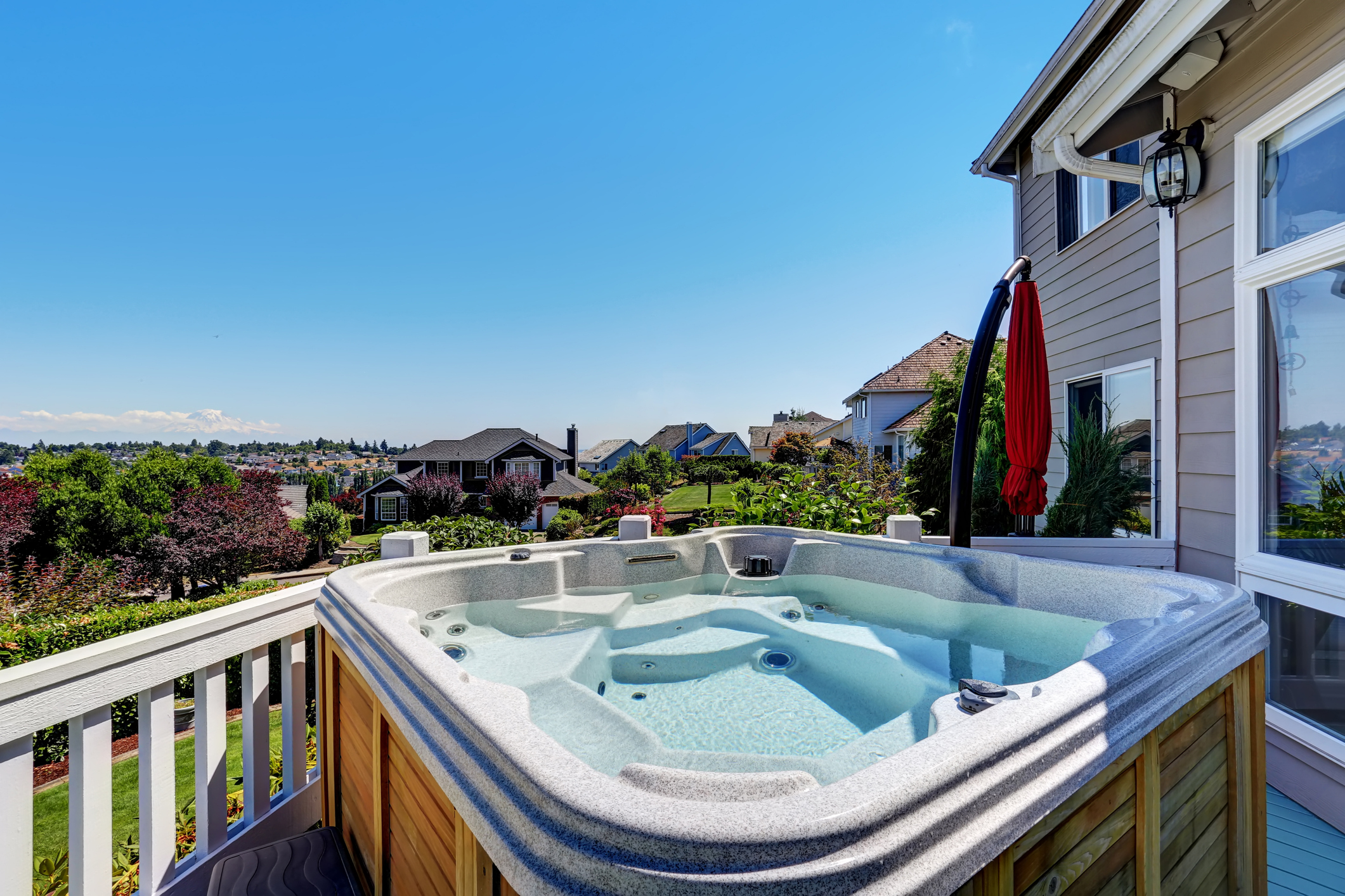 Close-up of a wooden hot tub at a luxury home, part of our selection of hot tubs for sale in Danbury, CT.